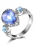 Серебряное кольцо ALEXANDRE VASSILIEVс голубым кварцем, топазом перламутром, марказитами и позолотой